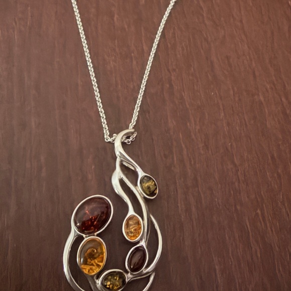 Jewelry - Elegant Silver and Amber Pendant Necklace